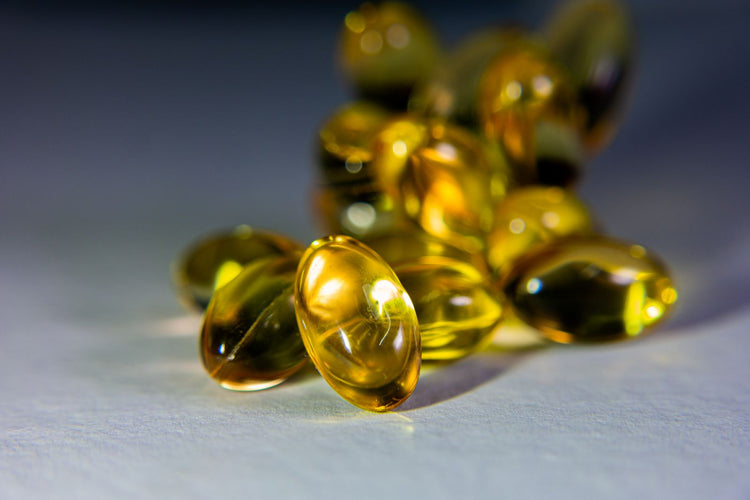 Capsulas doradas de omega 3
